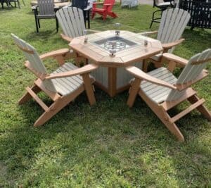 Fire pit with four folding Adirondack chairs