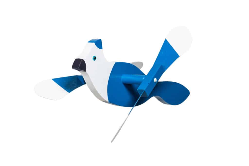 A wind spinner that looks like a blue jay.
