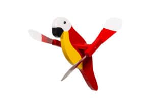 A wind spinner that looks like a red parrot.
